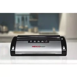 Food Processing Nesco Black Food Vacuum Sealer With Bag Cutter 16 Food Processing Nesco Black Food Vacuum Sealer With Bag Cutter -MegaChef Sales Shop black nesco food vacuum sealers vs 02 4f 1000